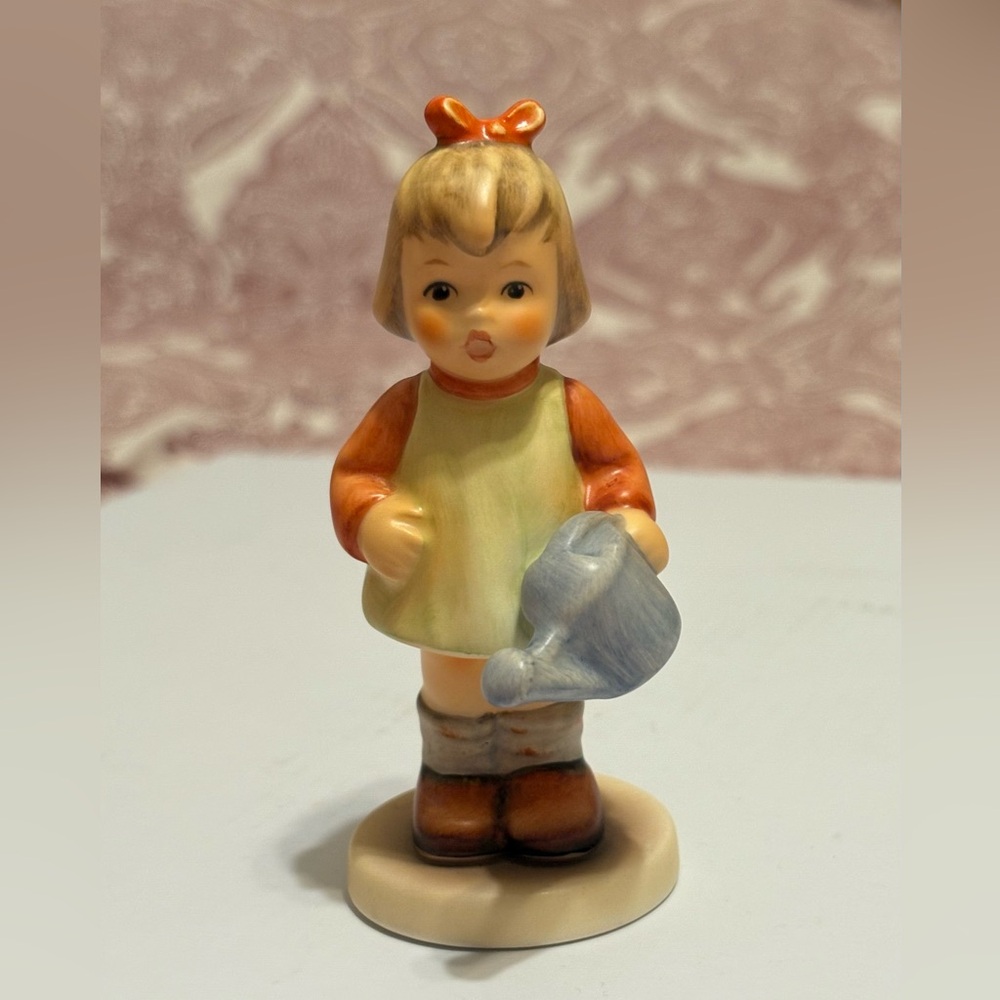 Goebel Girl Figurine with Apron & Blue Watering Can - Cream, Orange, Blue